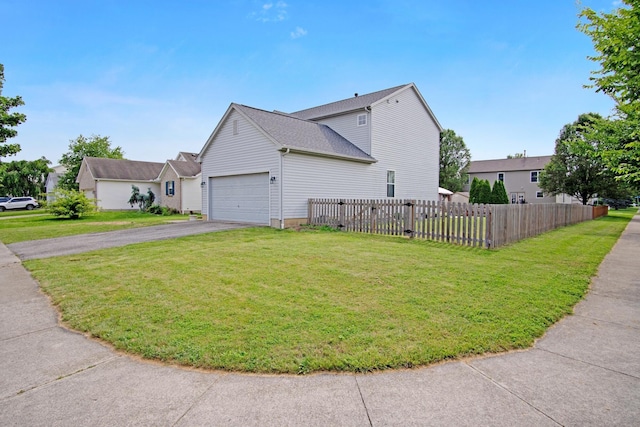 237 Harvard Loop, Delaware, OH 43015 - view of side of home featuring a garage and driveway