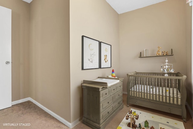 625 E Mulberry St, Lancaster, OH 43130 - carpeted bedroom featuring a crib and baseboards