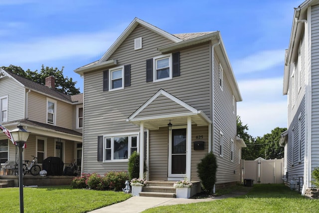 625 E Mulberry St, Lancaster, OH 43130 - view of front of property with a front lawn and a porch