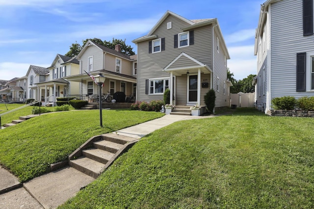 625 E Mulberry St, Lancaster, OH 43130 - view of front facade featuring covered porch and a residential view