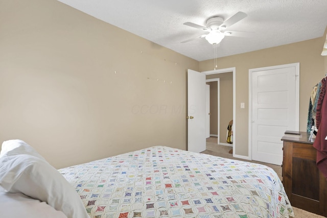 625 E Mulberry St, Lancaster, OH 43130 - bedroom with a textured ceiling, carpet flooring, and ceiling fan