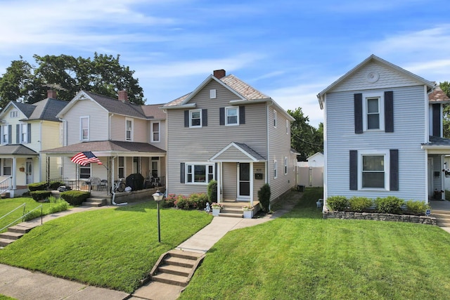 625 E Mulberry St, Lancaster, OH 43130 - traditional-style house featuring a front yard