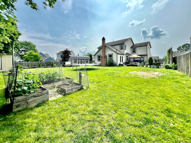 8576 Army Pl, Galloway, OH 43119 - view of yard featuring a garden and a storage unit