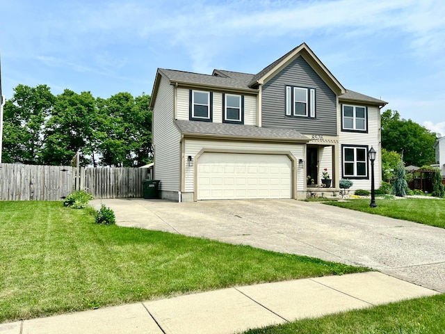 8576 Army Pl, Galloway, OH 43119 - traditional home featuring an attached garage and concrete driveway