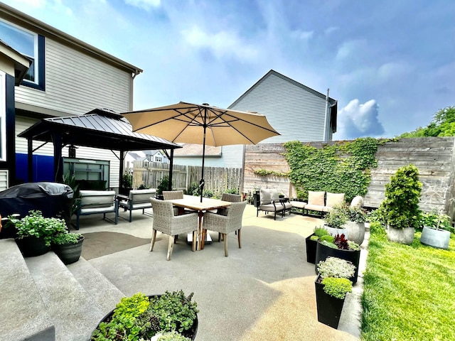 8576 Army Pl, Galloway, OH 43119 - view of patio with an outdoor living space, a gazebo, area for grilling, and outdoor dining space