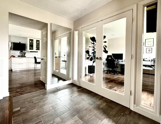 8576 Army Pl, Galloway, OH 43119 - doorway featuring dark wood finished floors, an office area, french doors, and a textured ceiling