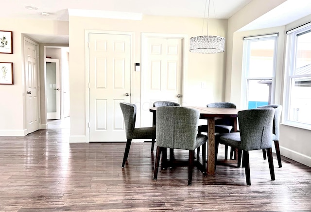 8576 Army Pl, Galloway, OH 43119 - dining space featuring plenty of natural light and dark wood finished floors