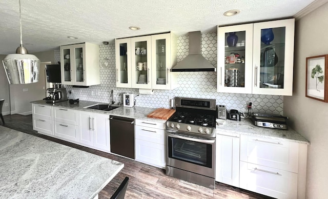 8576 Army Pl, Galloway, OH 43119 - kitchen featuring wall chimney range hood, gas stove, dishwasher, white cabinets, and a textured ceiling