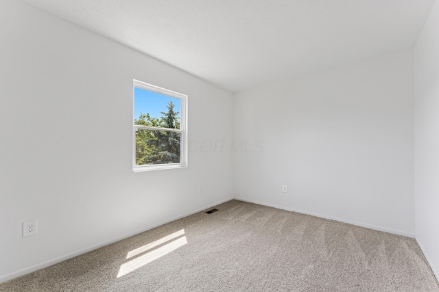 914 Worthington Woods Blvd Unit 11, Columbus, OH 43085 - carpeted empty room featuring baseboards