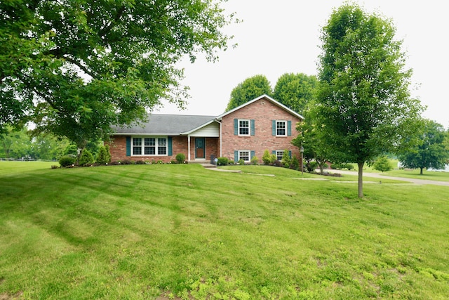 249 Orchard View Dr NE, Lancaster, OH 43130 - split level home featuring brick siding and a front yard