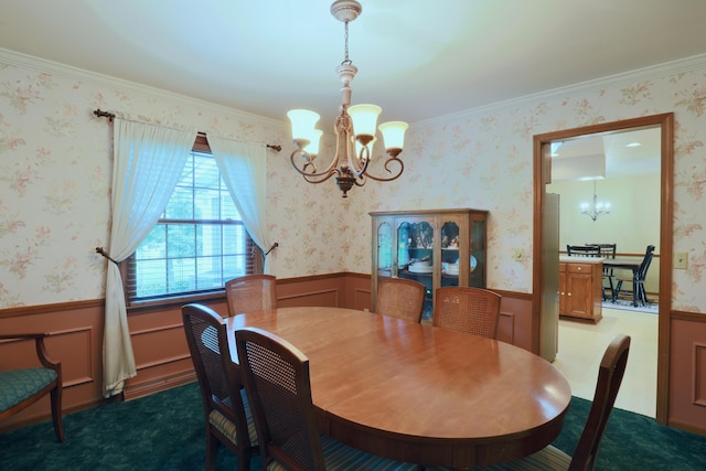 249 Orchard View Dr NE, Lancaster, OH 43130 - dining room featuring a chandelier, wainscoting, and crown molding