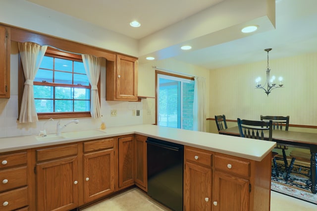 249 Orchard View Dr NE, Lancaster, OH 43130 - kitchen featuring black dishwasher, a peninsula, brown cabinets, decorative backsplash, and recessed lighting