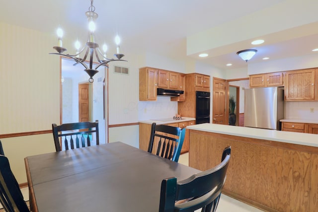 249 Orchard View Dr NE, Lancaster, OH 43130 - dining area with a chandelier and recessed lighting