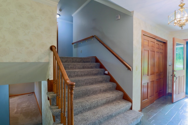 249 Orchard View Dr NE, Lancaster, OH 43130 - stairs with crown molding, a chandelier, and wallpapered walls