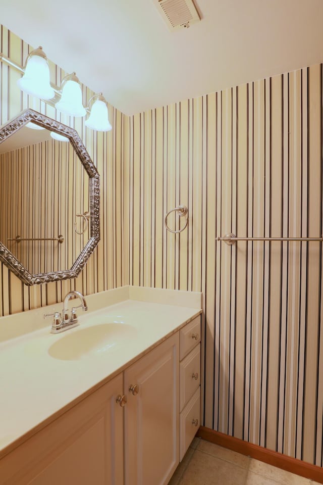 249 Orchard View Dr NE, Lancaster, OH 43130 - bathroom featuring vanity, wallpapered walls, and tile patterned flooring