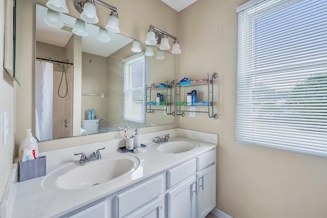 5684 Duchess Ct, Galloway, OH 43119 - bathroom with double vanity and a shower with curtain