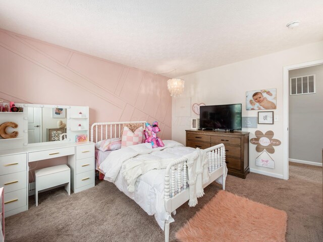 153 Shawnee Dr, Pickerington, OH 43147 - carpeted bedroom featuring a chandelier