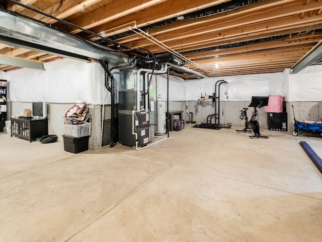 153 Shawnee Dr, Pickerington, OH 43147 - unfinished below grade area featuring water heater and heating unit