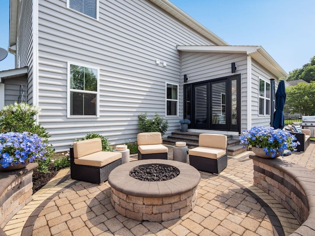 153 Shawnee Dr, Pickerington, OH 43147 - view of patio / terrace featuring an outdoor fire pit, french doors, entry steps, and a grill