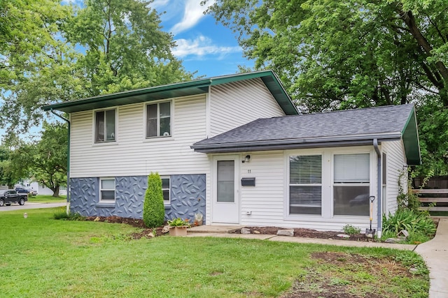 11 Richards Dr, Delaware, OH 43015 - tri-level home featuring a front yard and a shingled roof