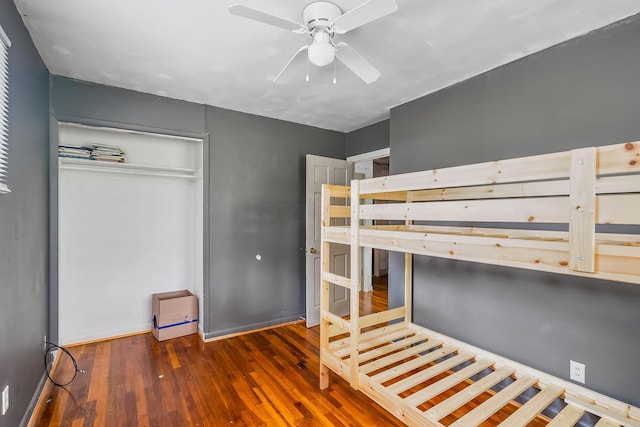 11 Richards Dr, Delaware, OH 43015 - unfurnished bedroom with wood finished floors, a closet, and ceiling fan