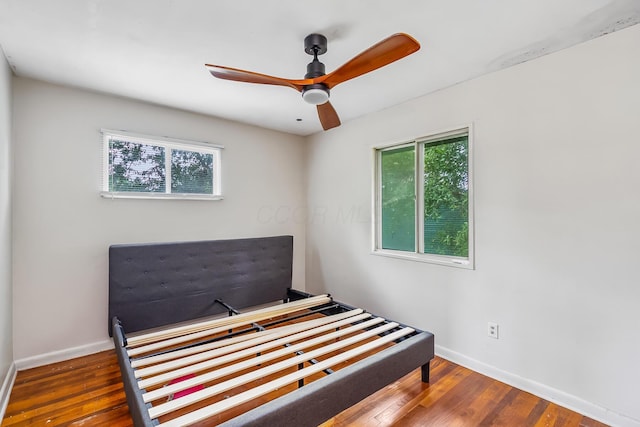 11 Richards Dr, Delaware, OH 43015 - bedroom with wood finished floors and a ceiling fan