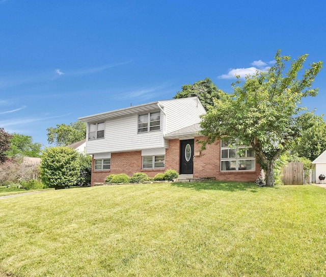 1121 Afton Rd, Columbus, OH 43221 - tri-level home featuring brick siding