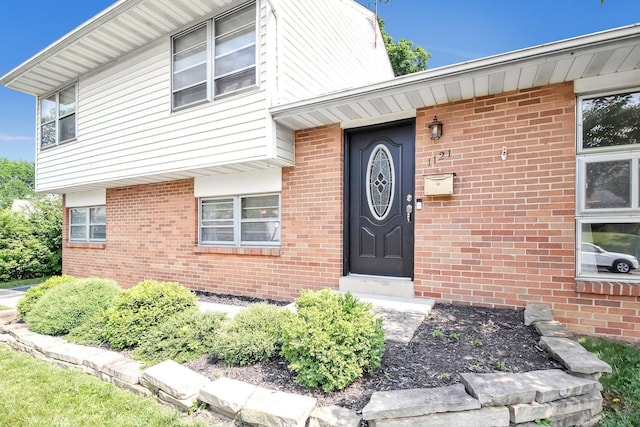 1121 Afton Rd, Columbus, OH 43221 - doorway to property featuring brick siding