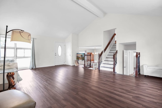 1121 Afton Rd, Columbus, OH 43221 - unfurnished living room with high vaulted ceiling, beamed ceiling, stairway, a chandelier, and wood finished floors