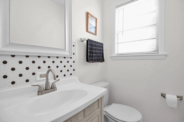 1121 Afton Rd, Columbus, OH 43221 - half bathroom with decorative backsplash and vanity