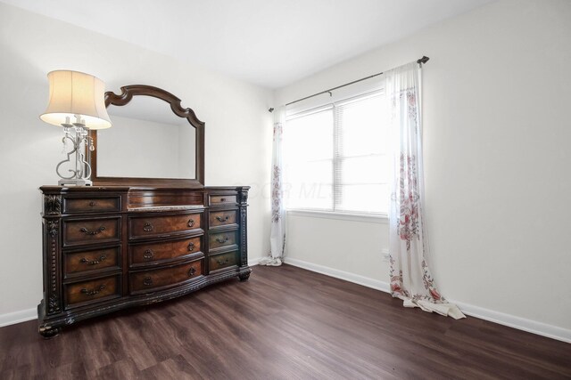 1121 Afton Rd, Columbus, OH 43221 - bedroom with dark wood-style floors