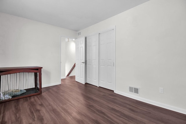 1121 Afton Rd, Columbus, OH 43221 - unfurnished bedroom with wood finished floors and a closet