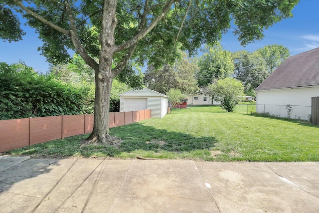 1121 Afton Rd, Columbus, OH 43221 - view of yard with a detached garage and an outbuilding