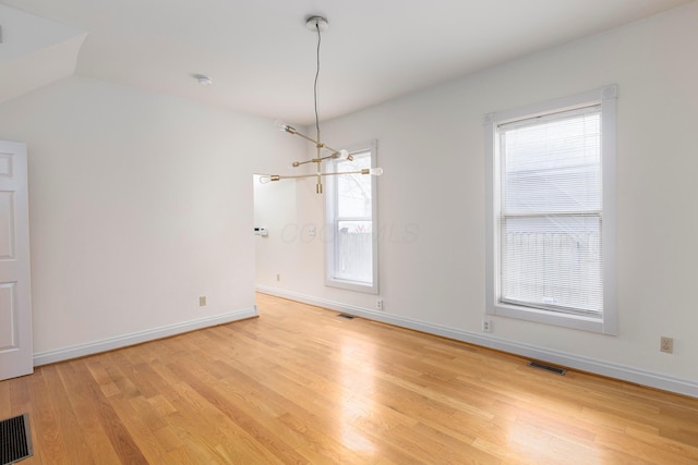 318 Berger Aly, Columbus, OH 43206 - unfurnished dining area featuring light wood-style flooring and healthy amount of natural light