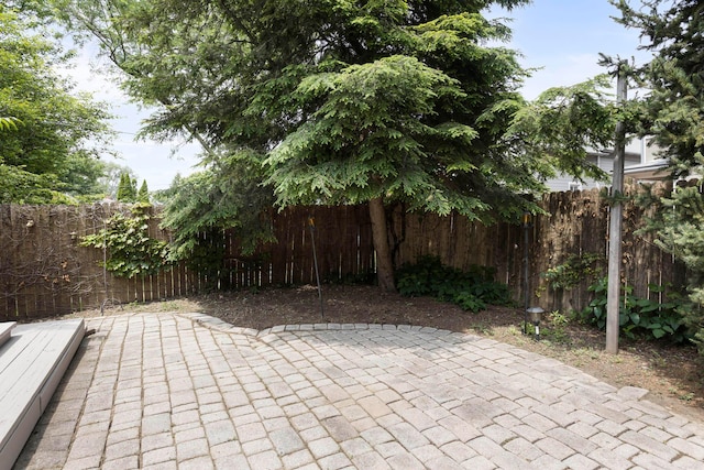 318 Berger Aly, Columbus, OH 43206 - fenced backyard featuring a patio area