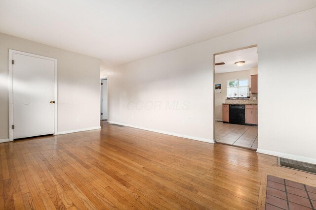 1208 Carolwood Ave, Columbus, OH 43227 - empty room featuring light wood-style floors