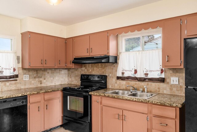 1208 Carolwood Ave, Columbus, OH 43227 - kitchen with black appliances, under cabinet range hood, and decorative backsplash
