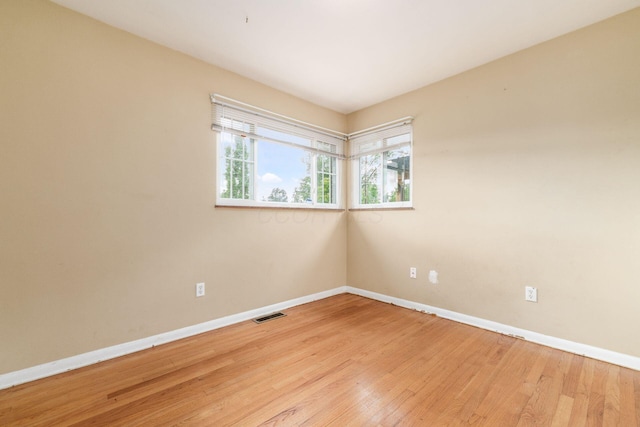 1208 Carolwood Ave, Columbus, OH 43227 - empty room featuring baseboards and light wood-style flooring