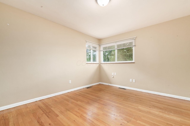 1208 Carolwood Ave, Columbus, OH 43227 - unfurnished room featuring baseboards and light wood-style flooring