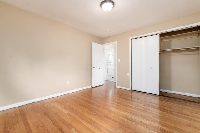 1208 Carolwood Ave, Columbus, OH 43227 - unfurnished bedroom featuring light wood-type flooring and a closet