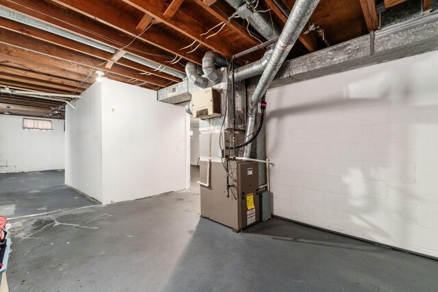 1208 Carolwood Ave, Columbus, OH 43227 - unfinished below grade area with heating unit and concrete block wall