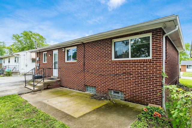 1208 Carolwood Ave, Columbus, OH 43227 - view of front of home featuring a patio and brick siding