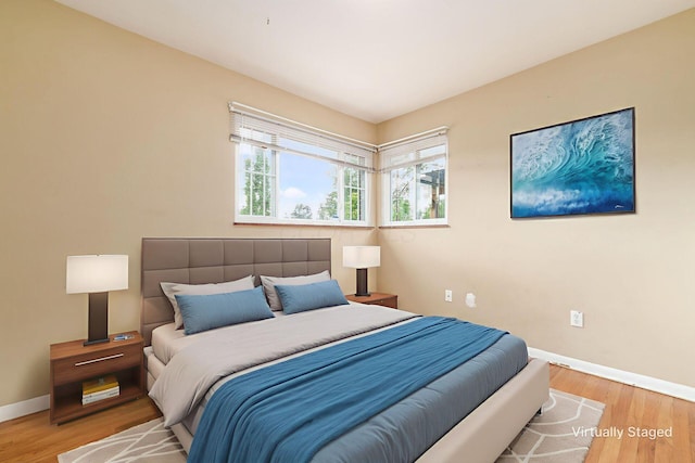 1208 Carolwood Ave, Columbus, OH 43227 - bedroom with baseboards and wood finished floors