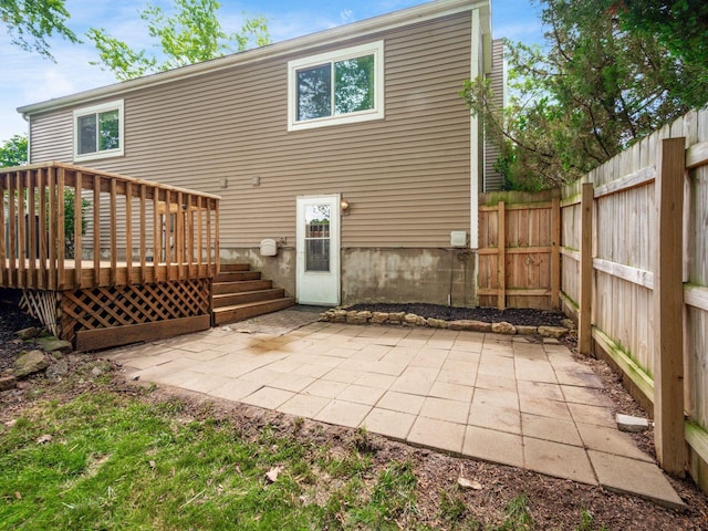 5264 Davidson Rd, Hilliard, OH 43026 - back of property featuring a wooden deck and a patio area