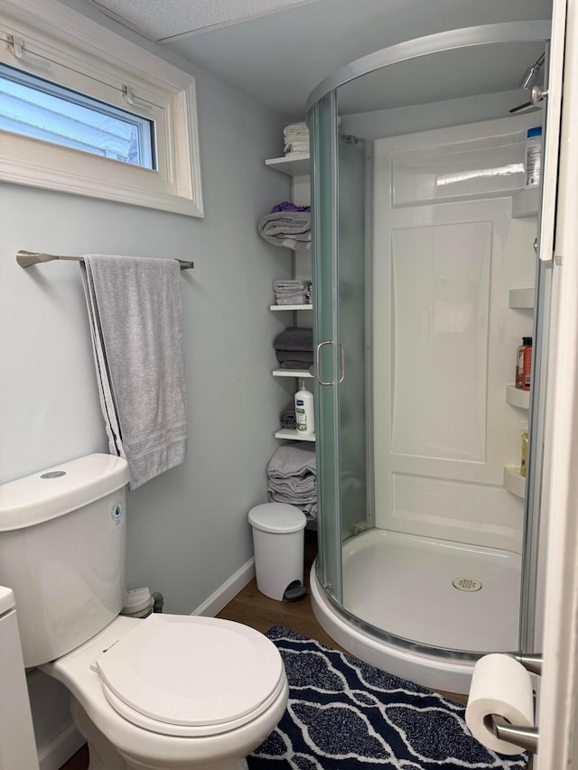 13997 Custers Point Rd NE, Thornville, OH 43076 - full bath featuring a shower stall and wood finished floors