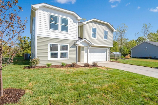 66 Genoa Cir, Commercial Point, OH 43116 - traditional-style home featuring a garage, driveway, and a front lawn