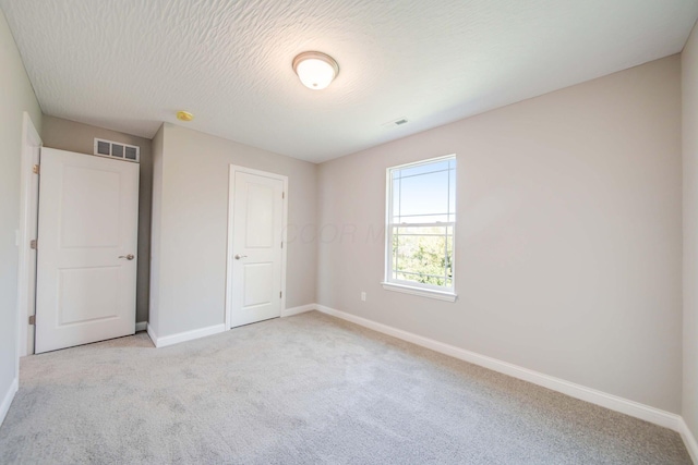 66 Genoa Cir, Commercial Point, OH 43116 - unfurnished bedroom featuring light colored carpet and baseboards