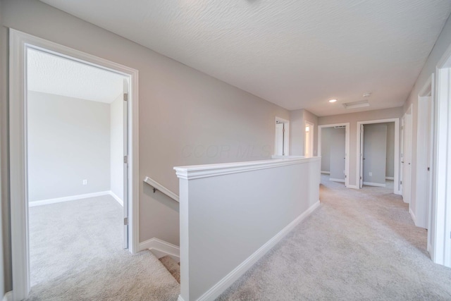 66 Genoa Cir, Commercial Point, OH 43116 - hallway featuring an upstairs landing, carpet flooring, and recessed lighting