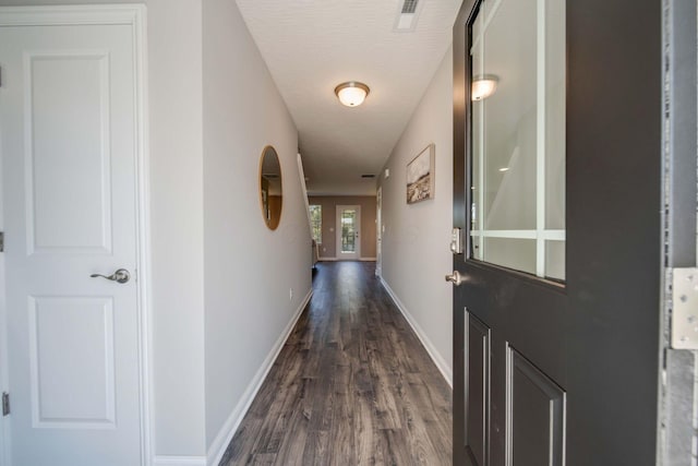 66 Genoa Cir, Commercial Point, OH 43116 - hall featuring dark wood-type flooring and baseboards