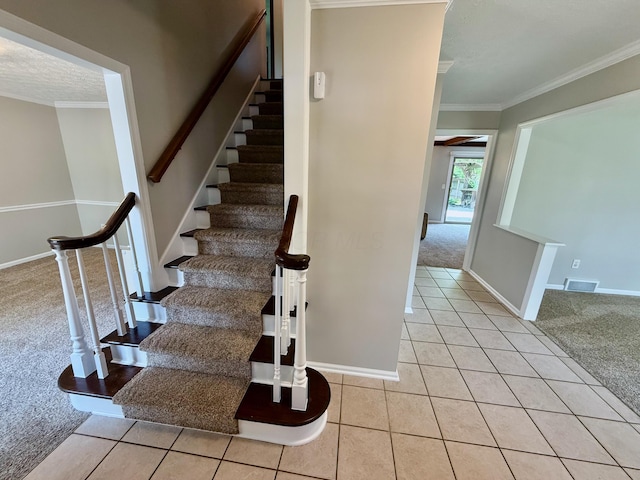 1724 Ramblewood Ave, Columbus, OH 43235 - stairs featuring carpet flooring, tile patterned flooring, and ornamental molding